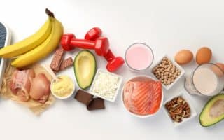 Concept of sports nutrition on white background